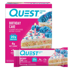 Quest Birthday Cake protein bar, unwrapped, rich flavor for post-workout fuel.