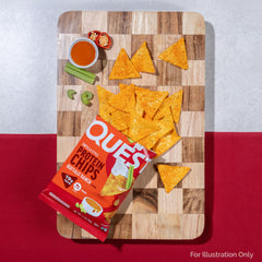 Quest Buffalo Ranch chips in desk area; convenient post-workout protein on hand.