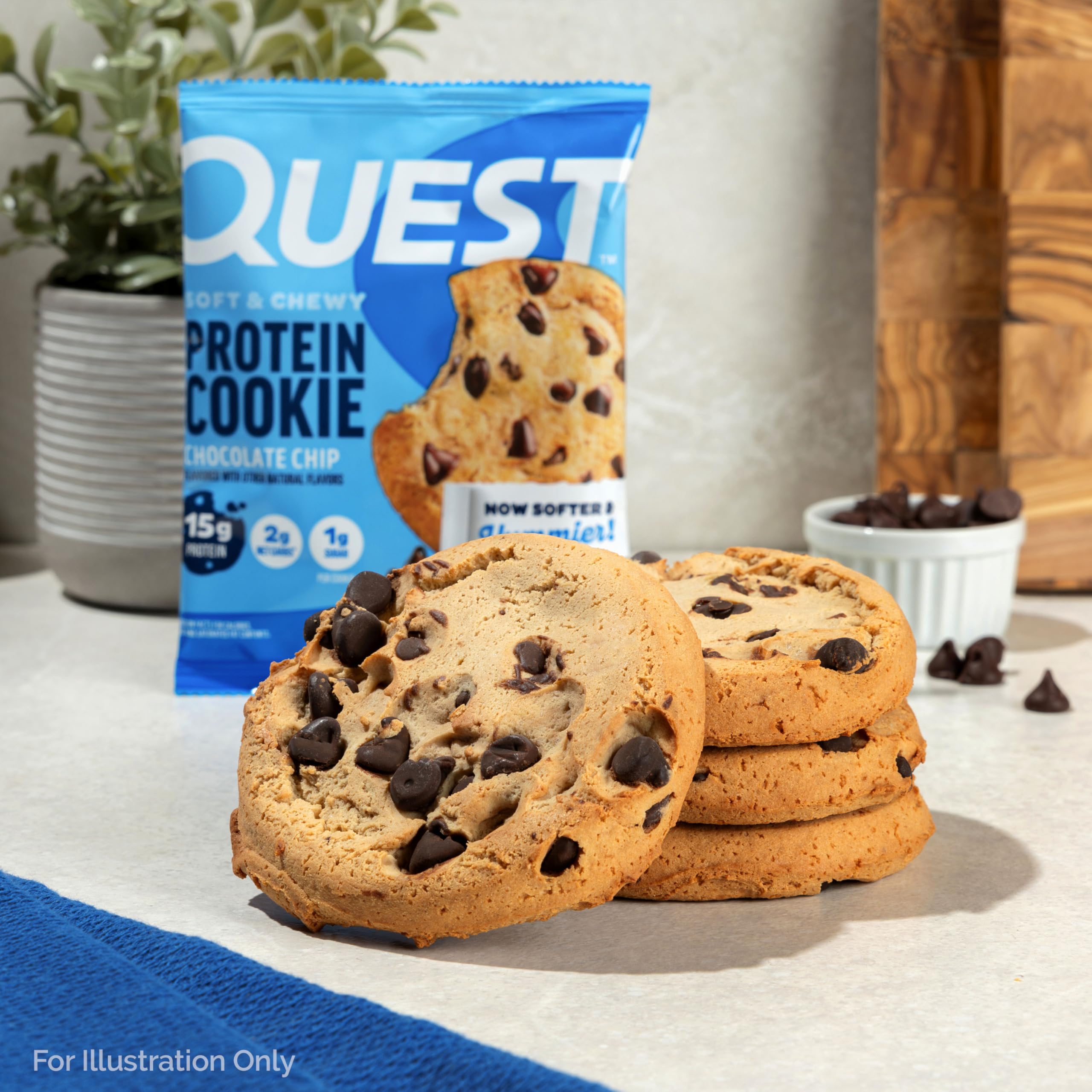 Desk-side Quest protein cookie next to laptop