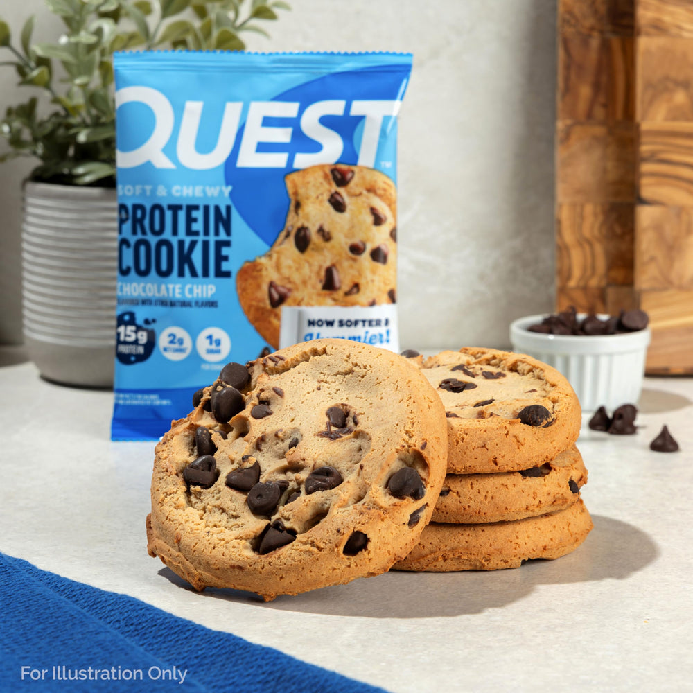 Desk-side Quest protein cookie next to laptop