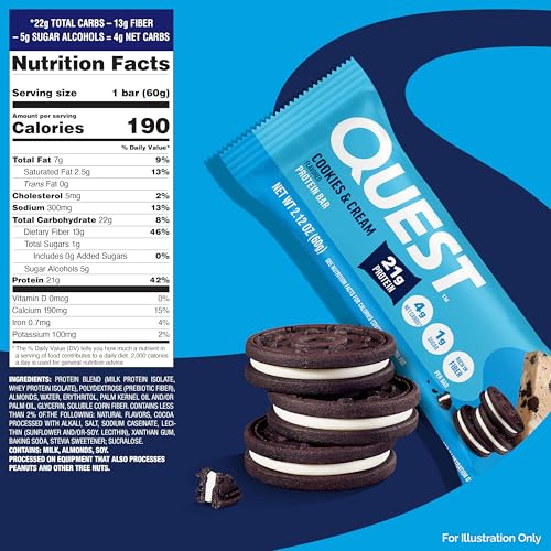 Quest Cookies & Cream bar on desk with coffee mug in view