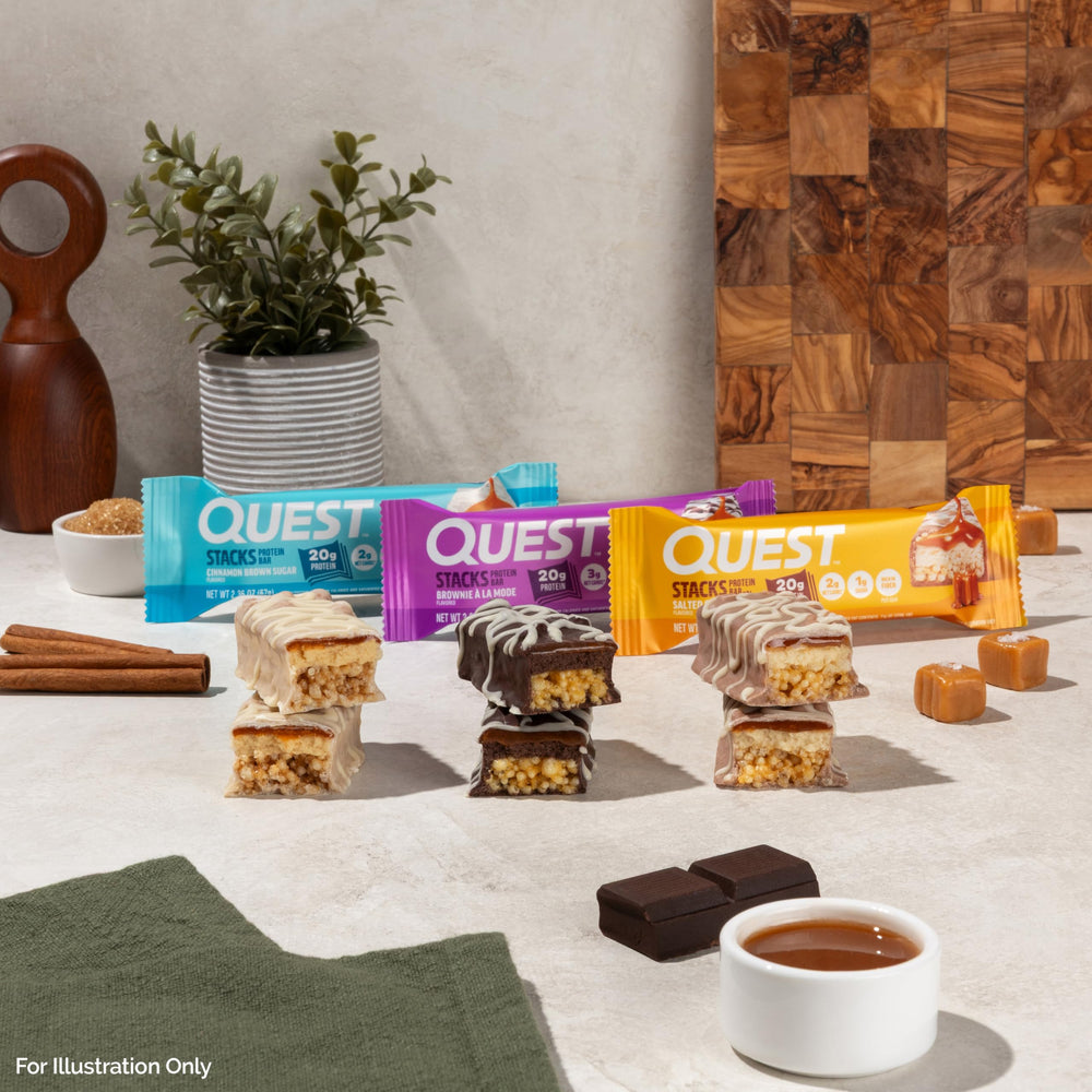 Four-bar carton of Quest Stacks Salted Caramel Bar ready for the gym
