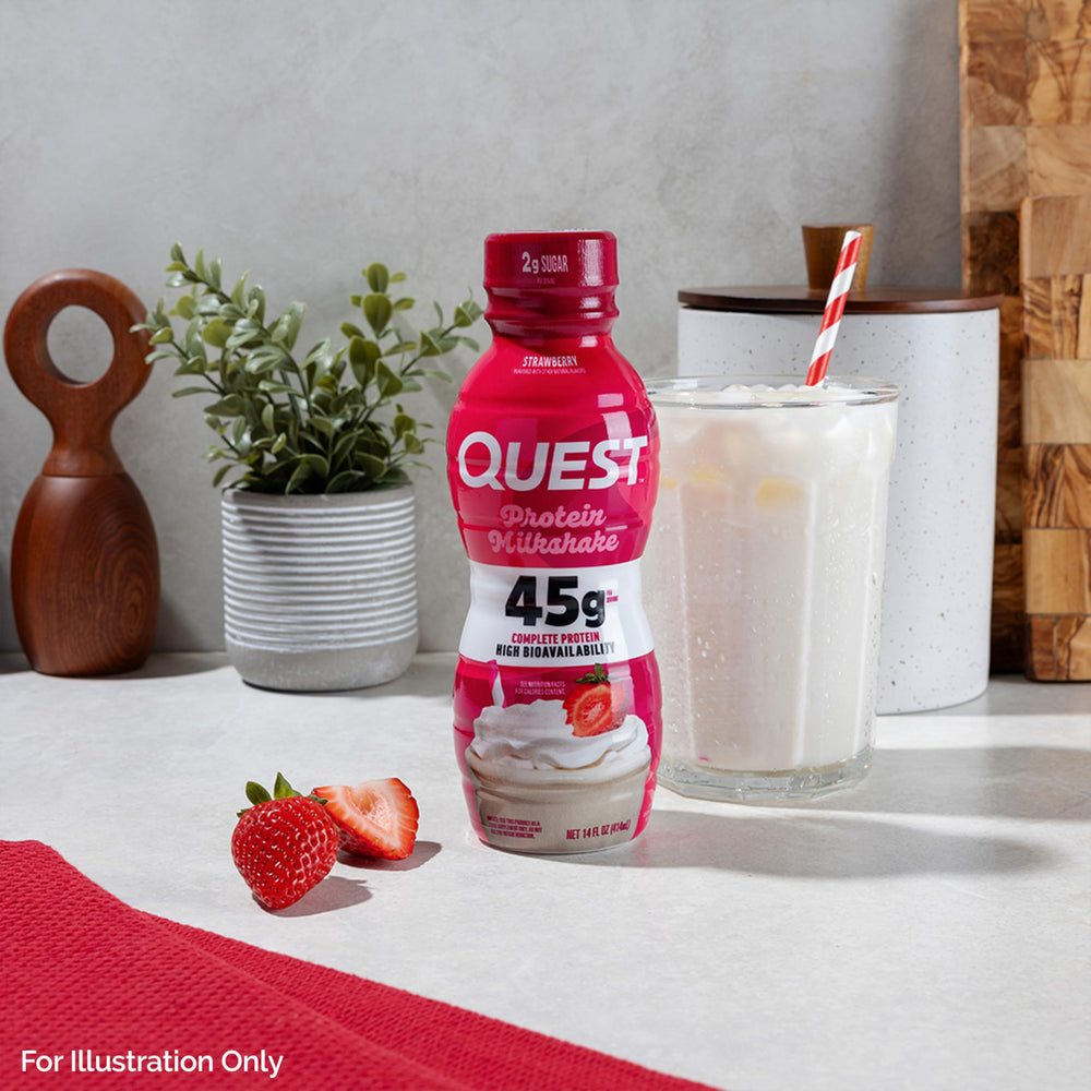 Quest strawberry protein shake pouring into glass reveals smooth texture and flavor
