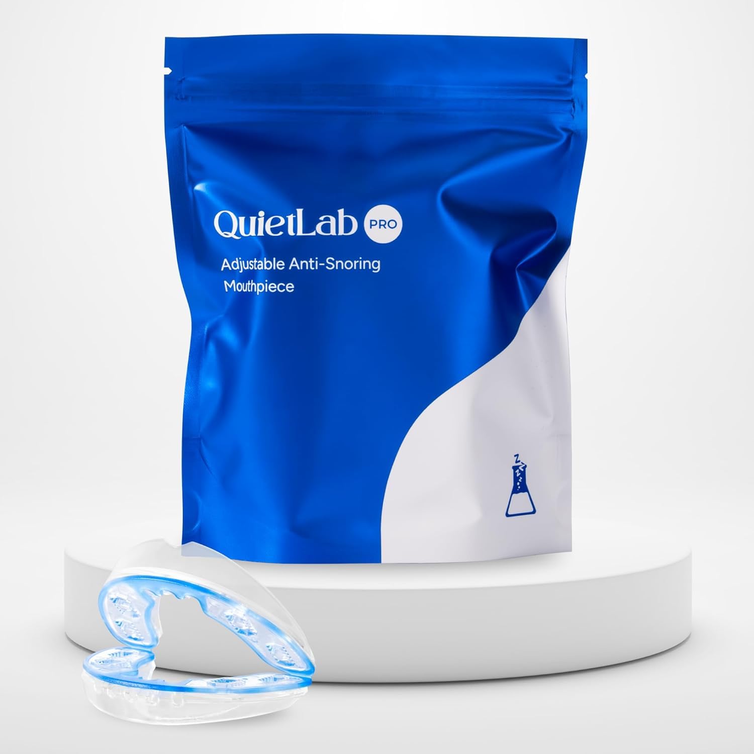 QuietLab Pro anti-snoring mouthpiece close-up showing compact all-night wear.