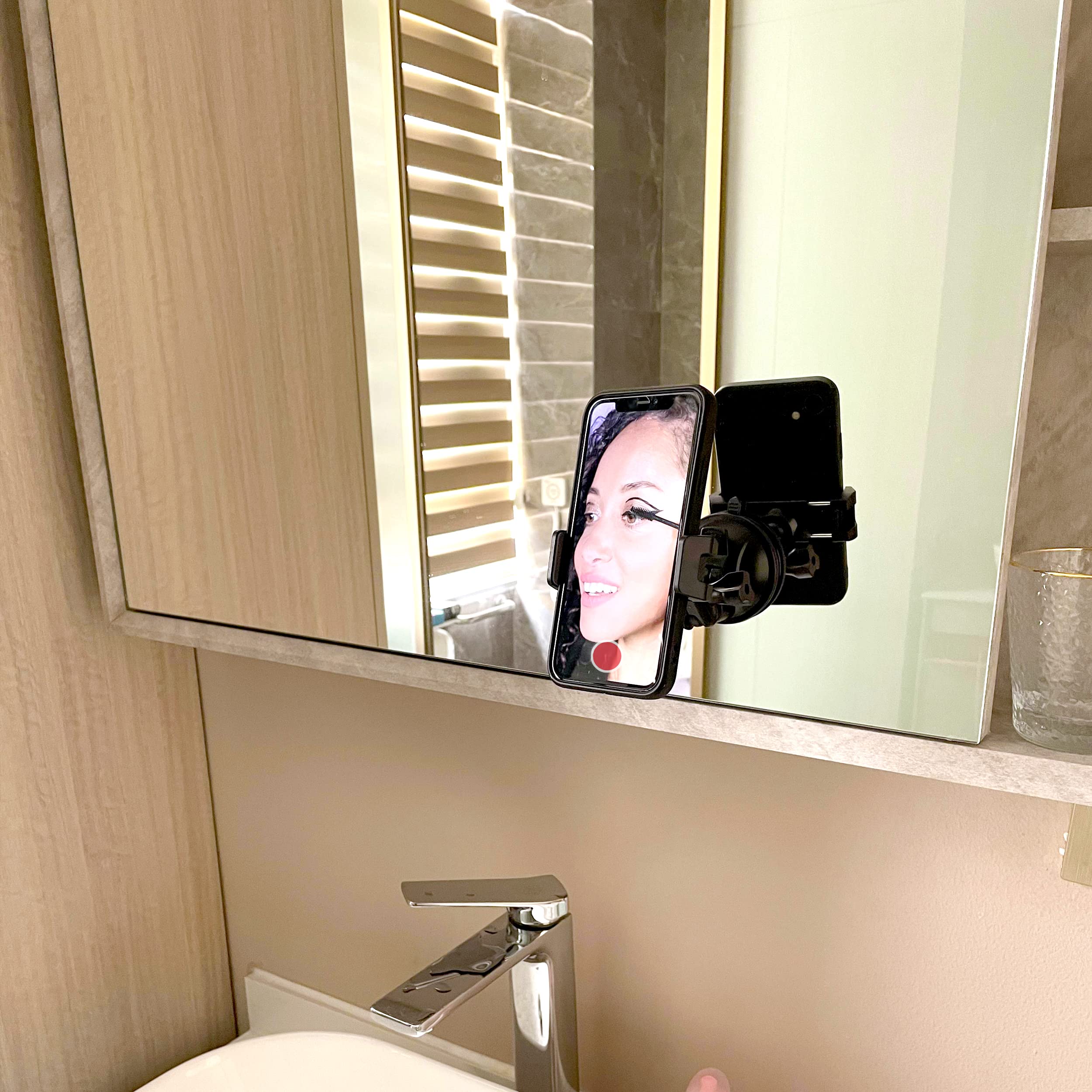 Quyee mirror holder displaying 360-degree rotation for versatile recording angles.