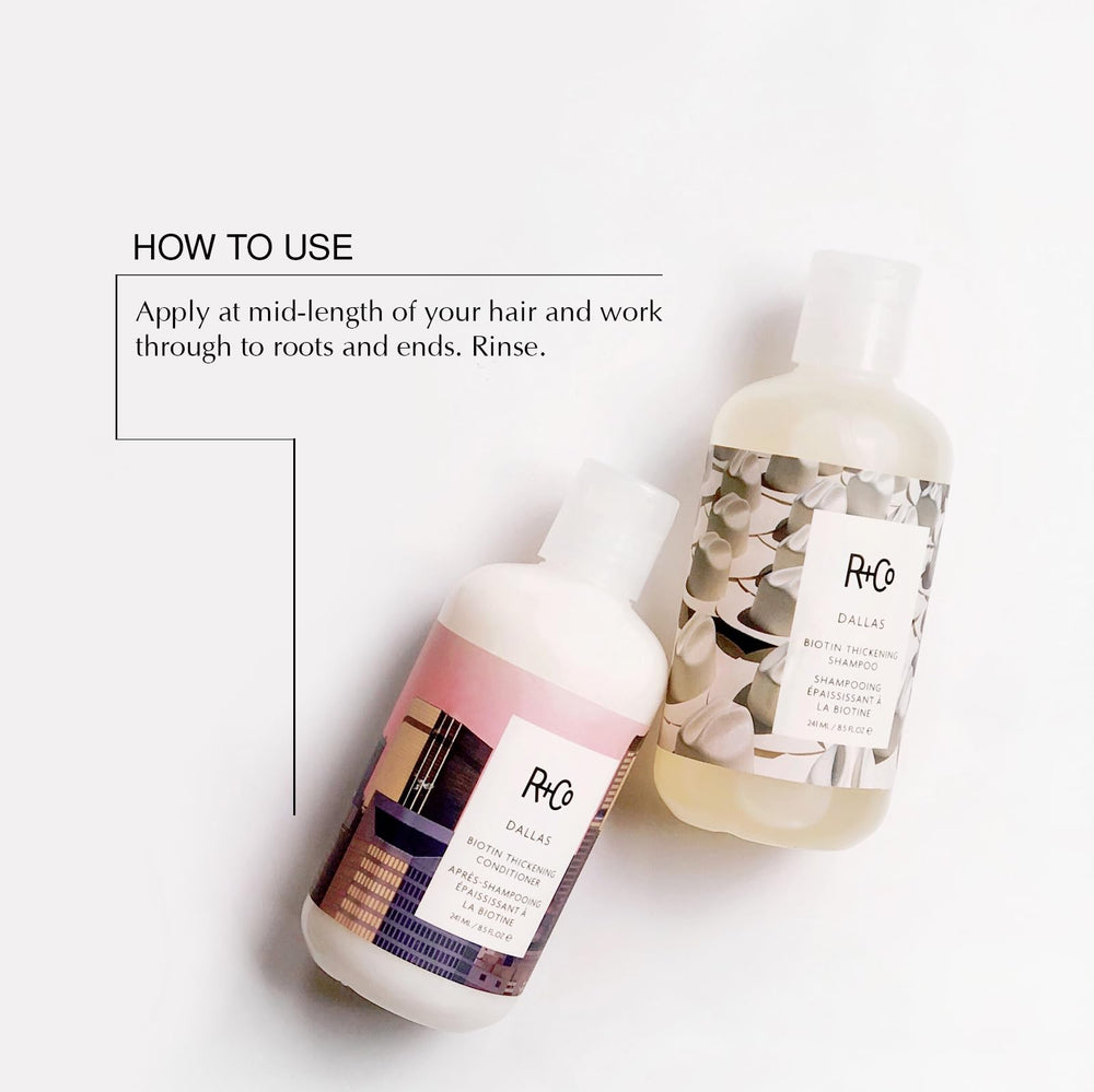 R+Co Dallas Thickening Conditioner bottle beside hair offers weightless fullness.