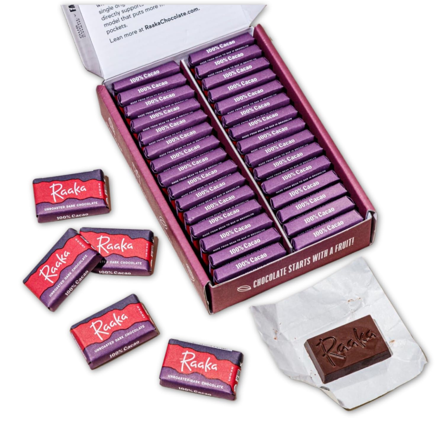 Raaka 100% dark chocolate mini bars close-up on the unsweetened box for pure cacao snacking.
