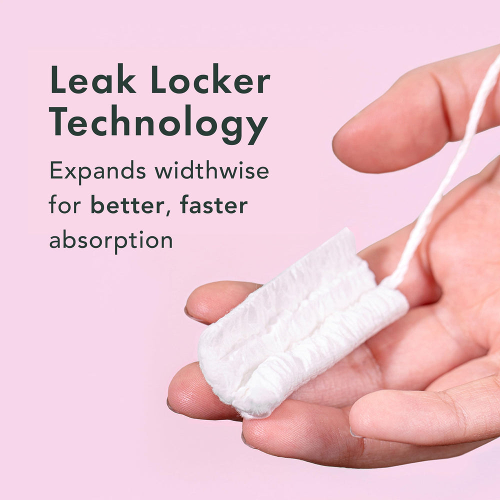 Rael tampons packaging wrapped in sustainable paper for on the go use.