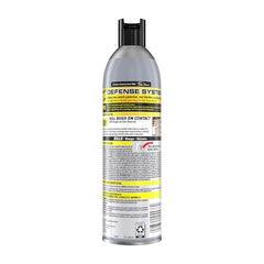 Raid Max spray action shows foam clinging to a nest for effective treatment.