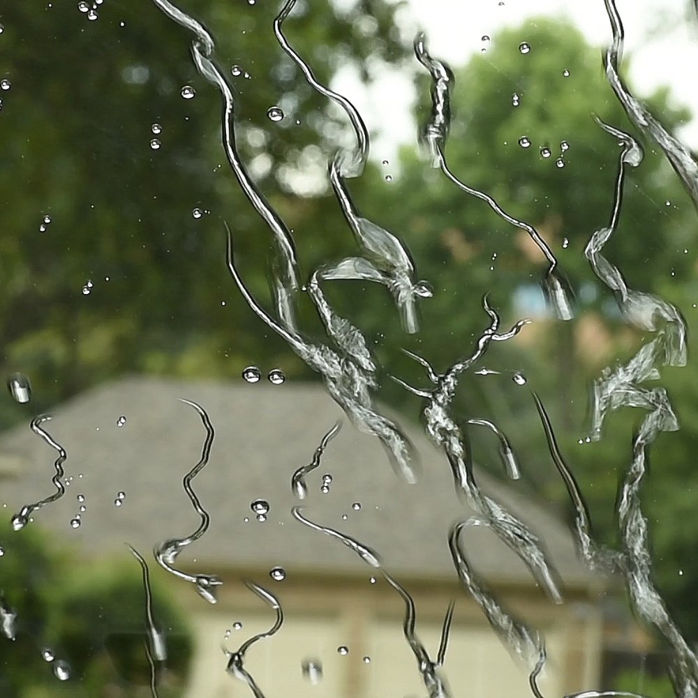 Rain-X Glass Treatment enhances wet-weather visibility on exterior glass.