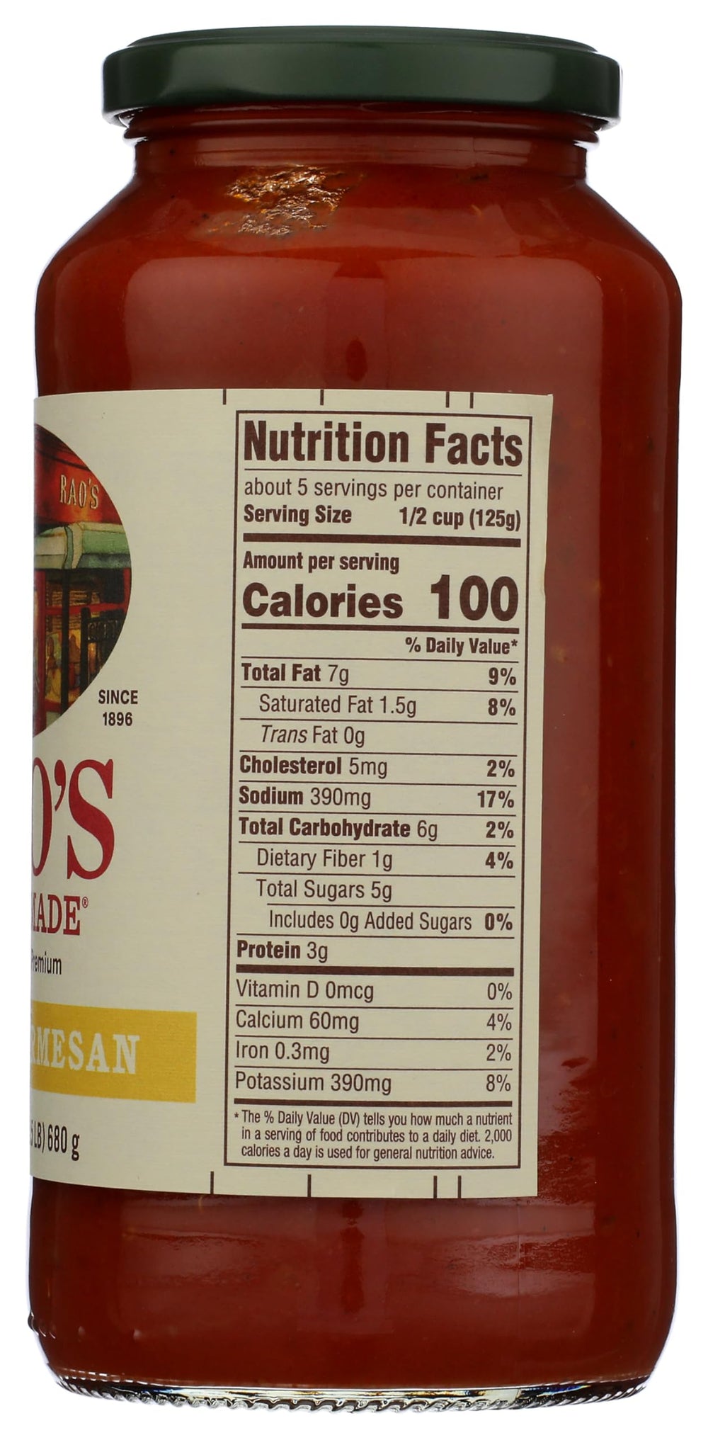Close-up of Rao's Lemon Marinara sauce jar pouring over pasta for quick meals.