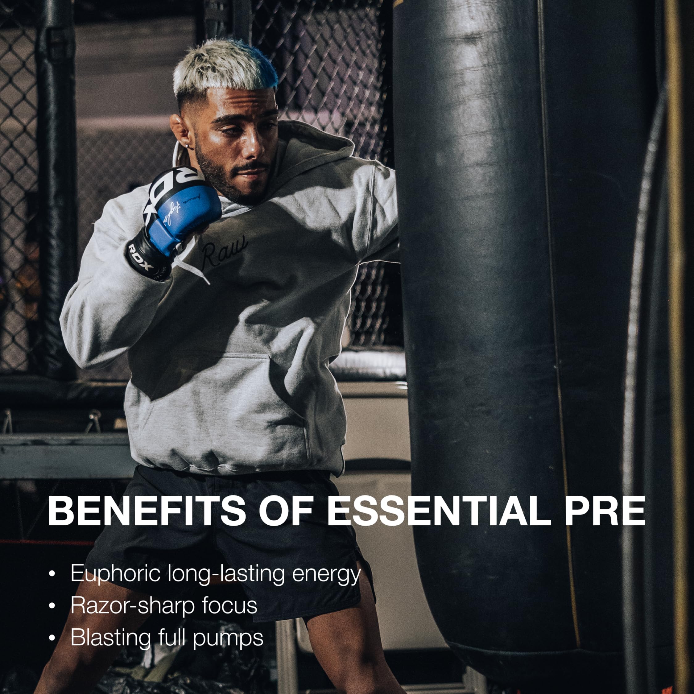 RAW Essential Pre-Workout Sour Watermelon mix in glass shows vibrant color and flavor.