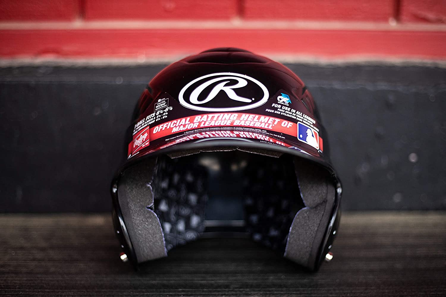 Rawlings COOLFLO T-Ball helmet pink worn by a youth player