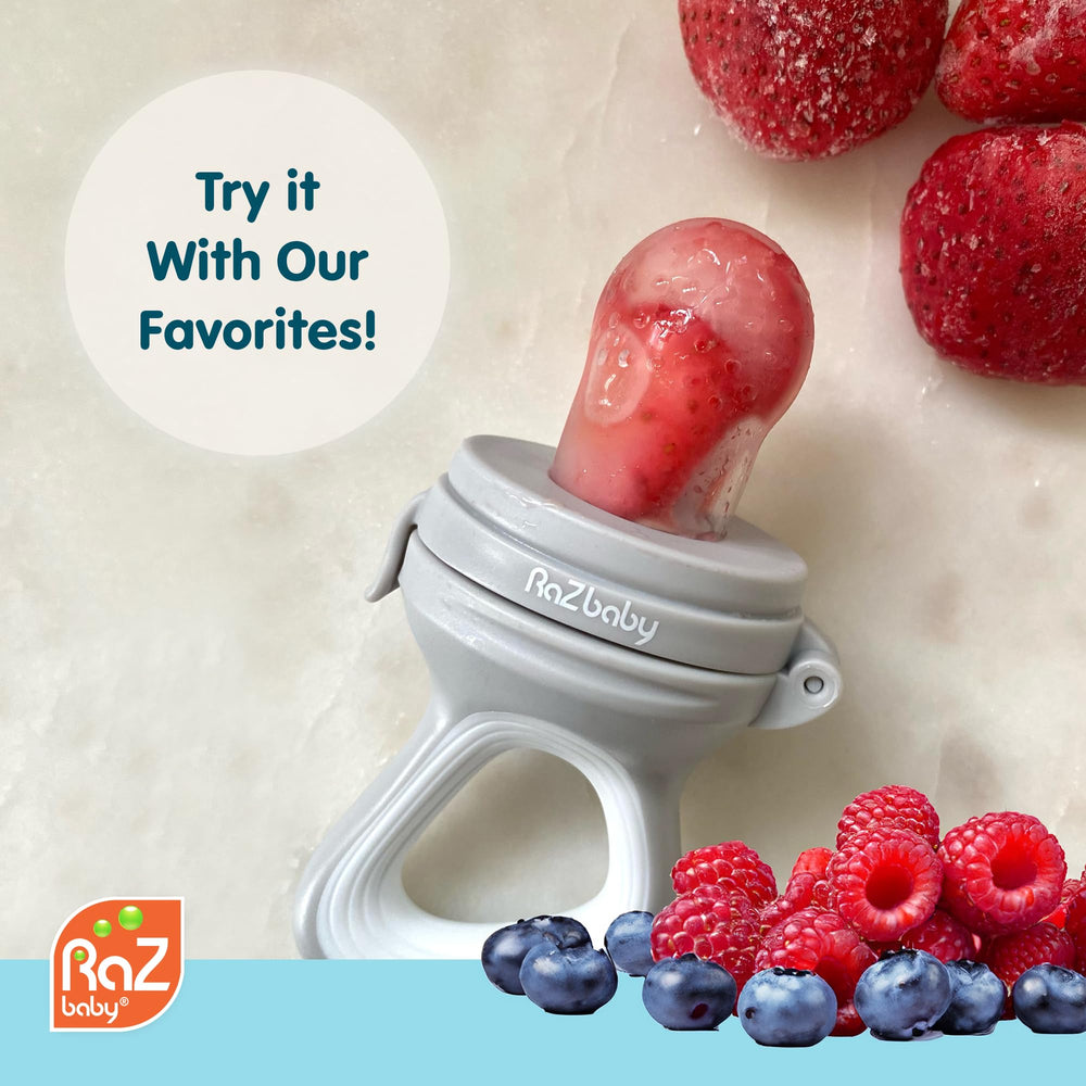 RaZbaby feeder with raspberries and bananas demonstrating real-food use.