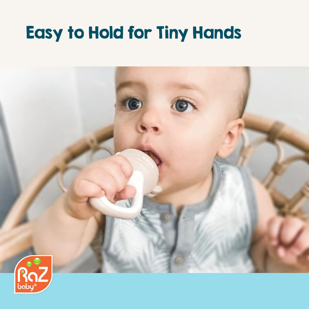 RaZbaby freezable feeder used with frozen berries for soothing gums.
