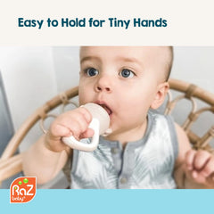 RaZbaby freezable feeder used with frozen berries for soothing gums.