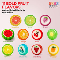 Close-up of assorted flavors: watermelon, kiwi, orange, lemon, pineapple, grape, cherry, strawberry.