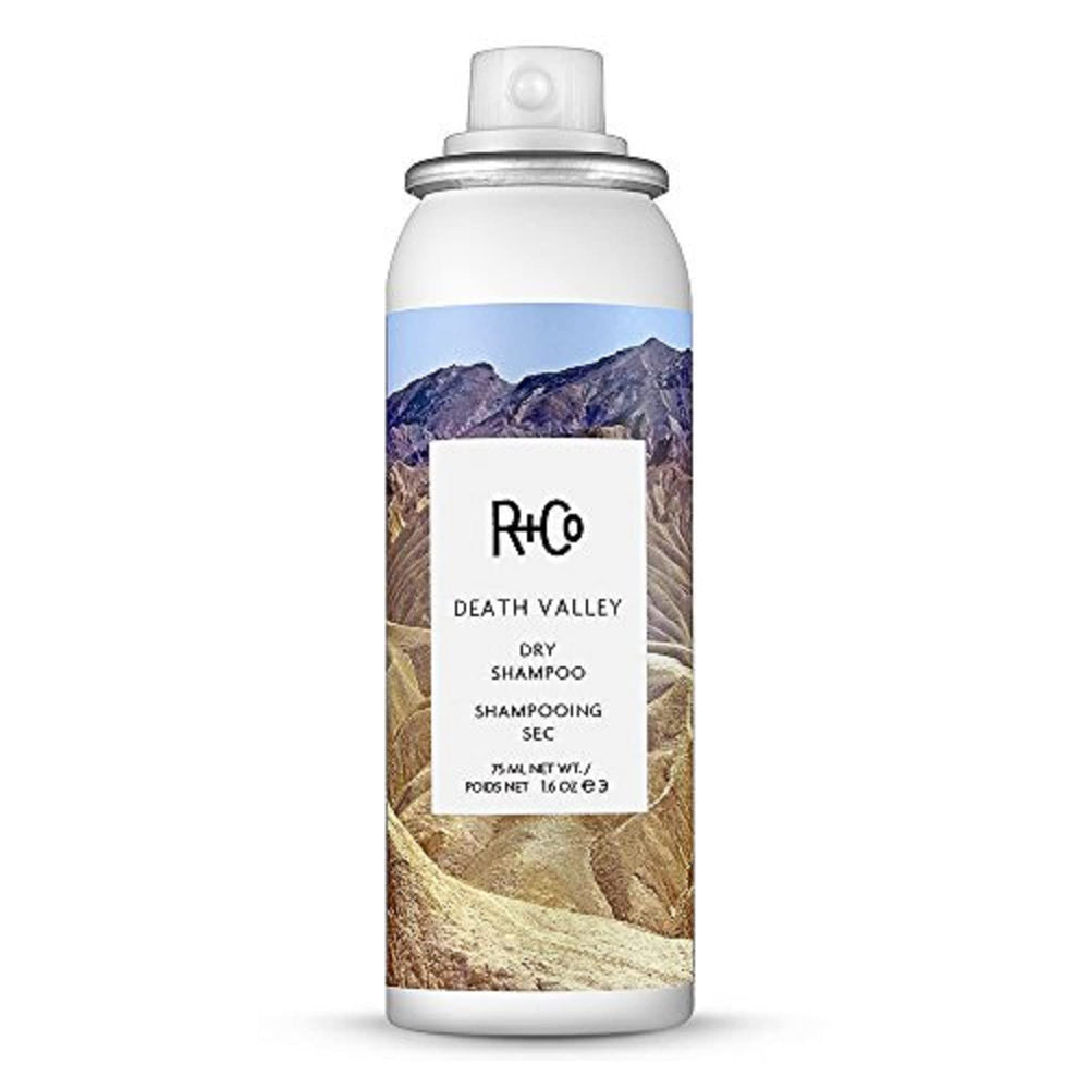 R+Co Death Valley Dry Shampoo bottle absorbs excess oil for refreshed roots.