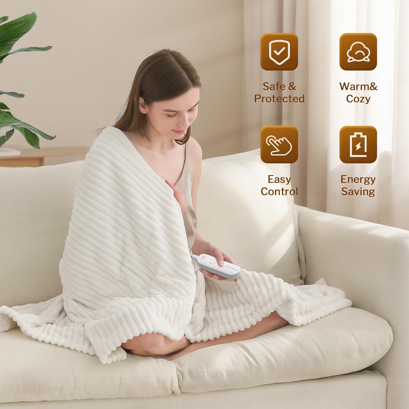 Reaks heated throw on couch provides instant comfort during movie night.