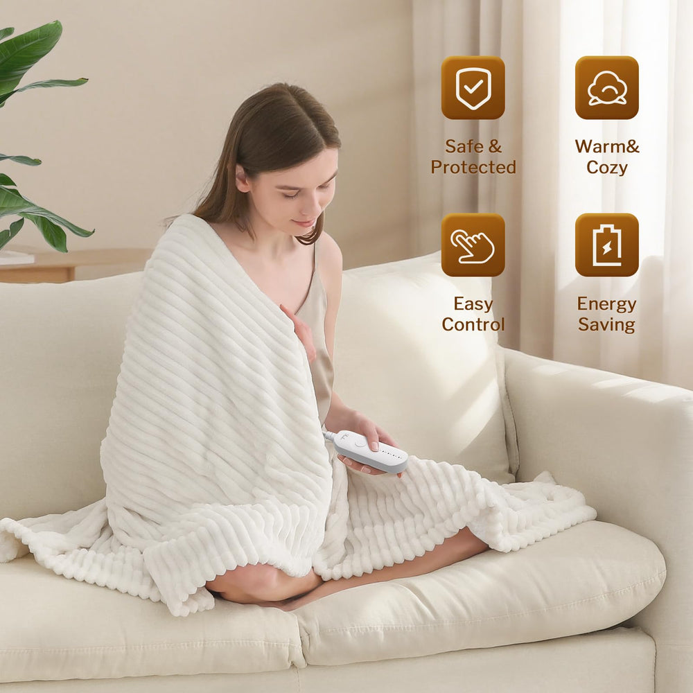 Reaks heated throw on couch provides instant comfort during movie night.