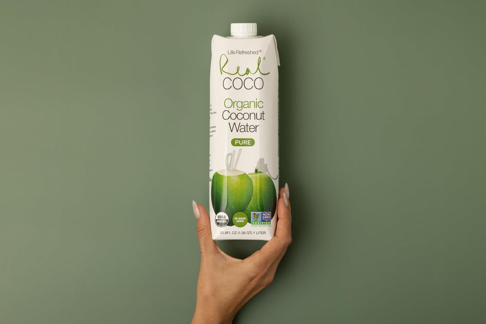 Refrigerated display with Real Coco ensures ready-to-drink vegan hydration.