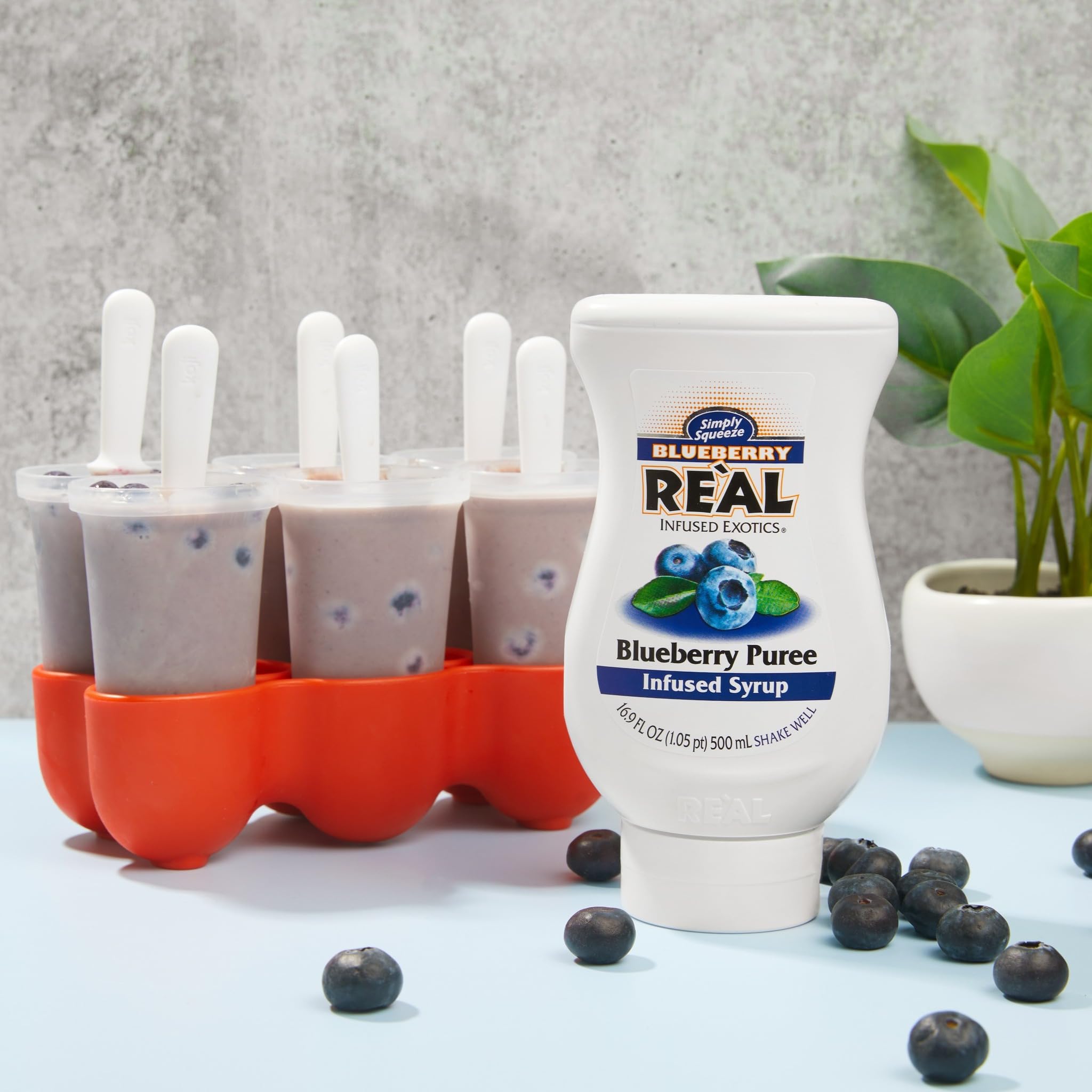 Dessert-ready blueberry syrup from Reàl Infused Exotics in a bowl presentation.