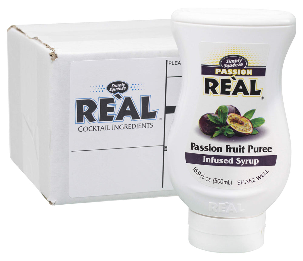 Reàl Infused Exotics Passion Fruit Puree Syrup bottle for vibrant cocktails.