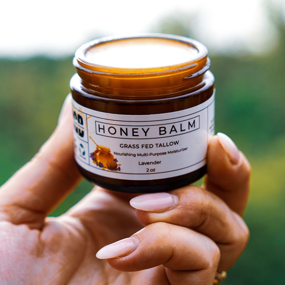 Close-up of balm texture showing creamy hydration on skin.