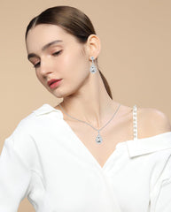 REASAYLL Austrian crystal center teardrop earrings add refined evening shine.