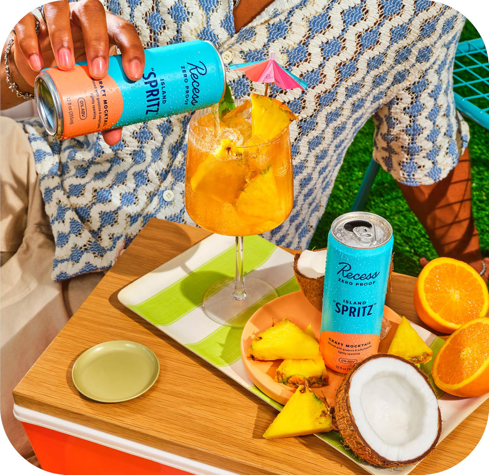 Recess Island Spritz pineapple coconut flavor highlighted for a tropical mocktail.
