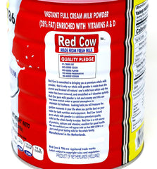 Red Cow milk powder jar highlighting Netherlands origin and high quality.