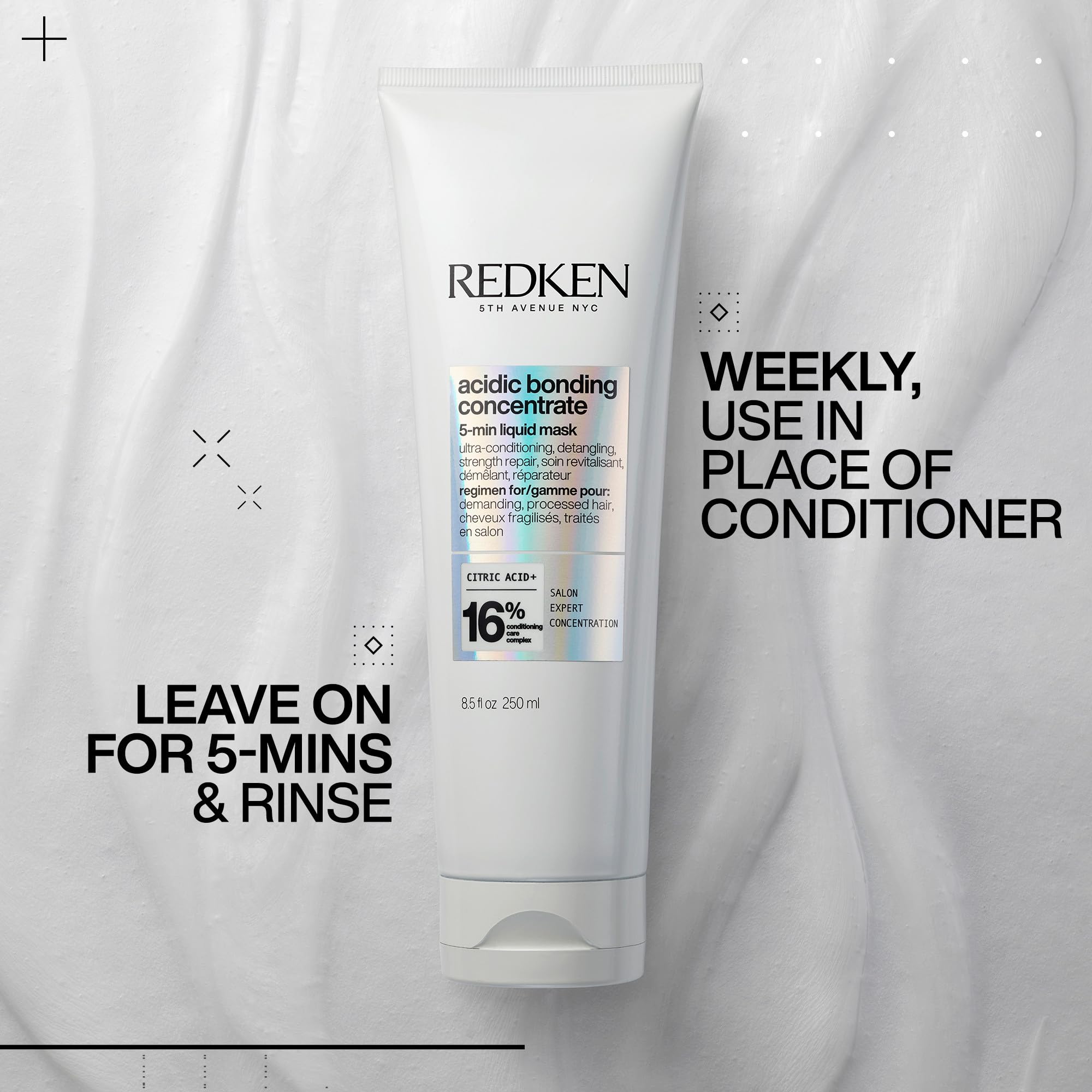 Redken Acidic Bonding Concentrate applied to wet hair evenly.