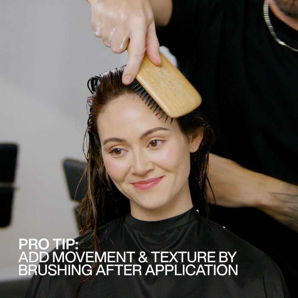 Gel-to-mousse transformation of Redken Stay High Mousse on hair