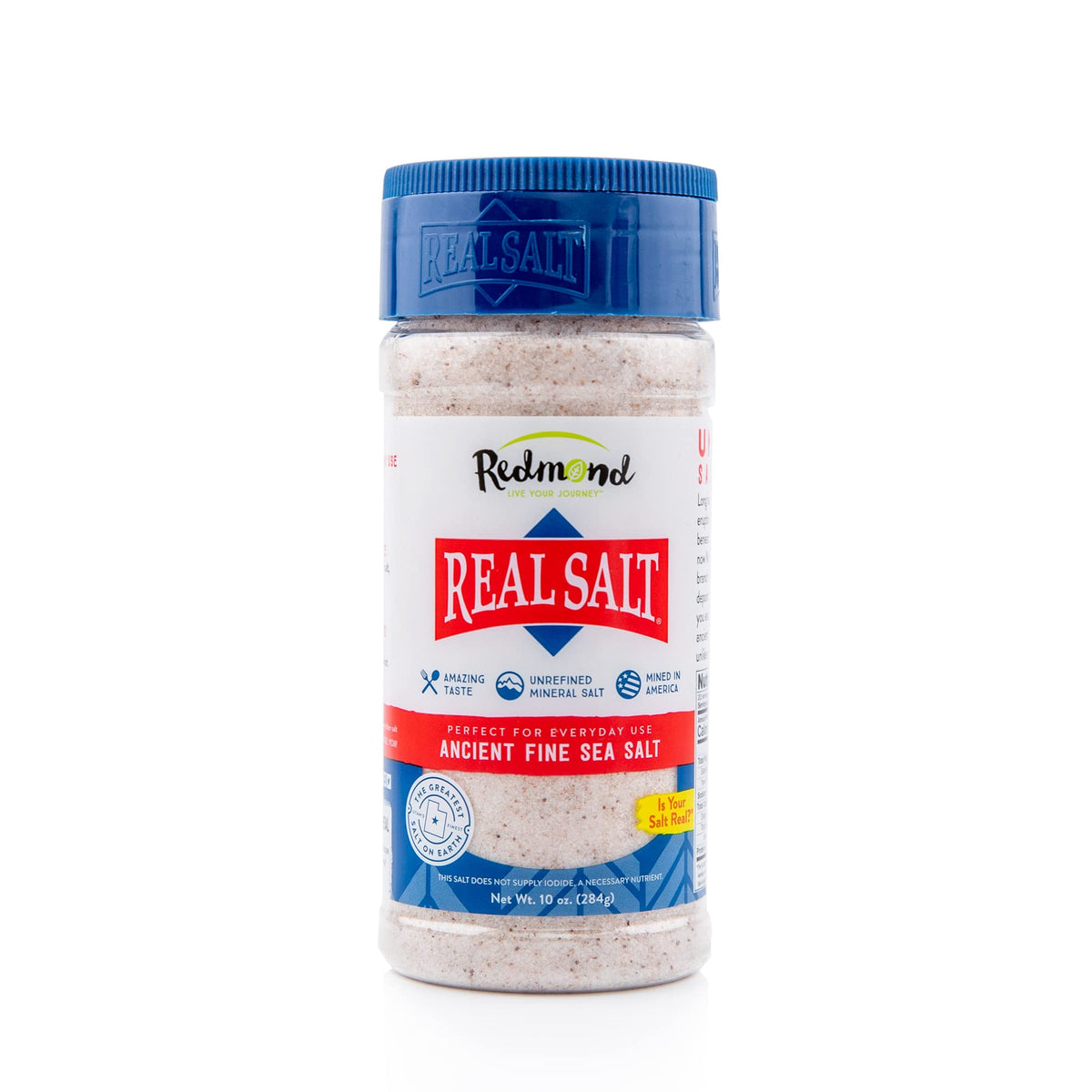 Redmond Real Sea Salt 10oz shaker closeup, premium flavor enhancer for everyday cooking.