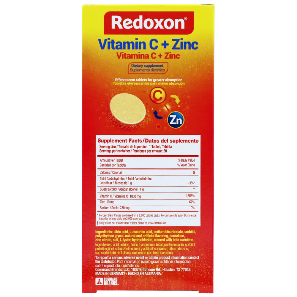 Redoxon measuring scoop beside glass, illustrating easy daily dosing for immunity.