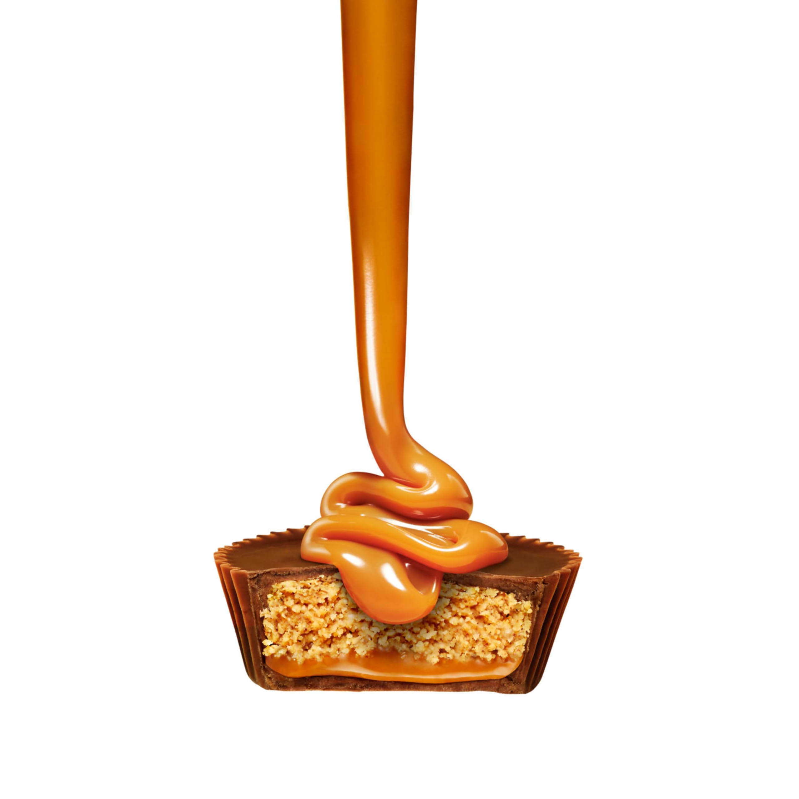Close-up of caramel and peanut butter layers inside REESE'S Big Cup