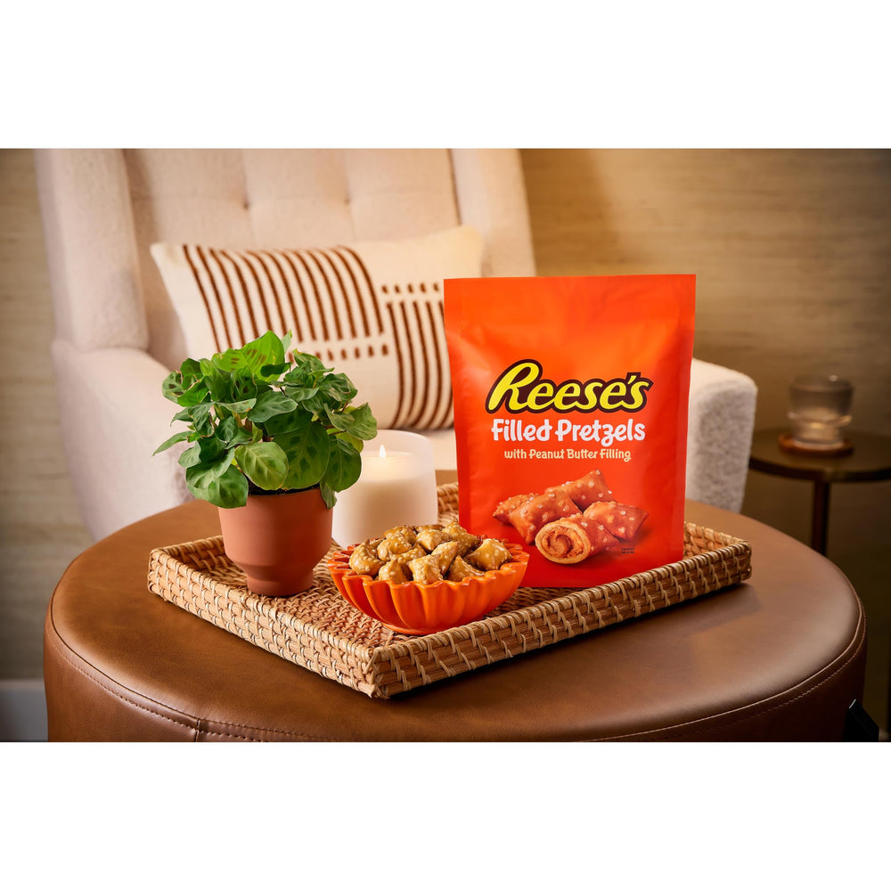 Snack bowl filled with Reese's Pretzels, ideal party bite appeal.