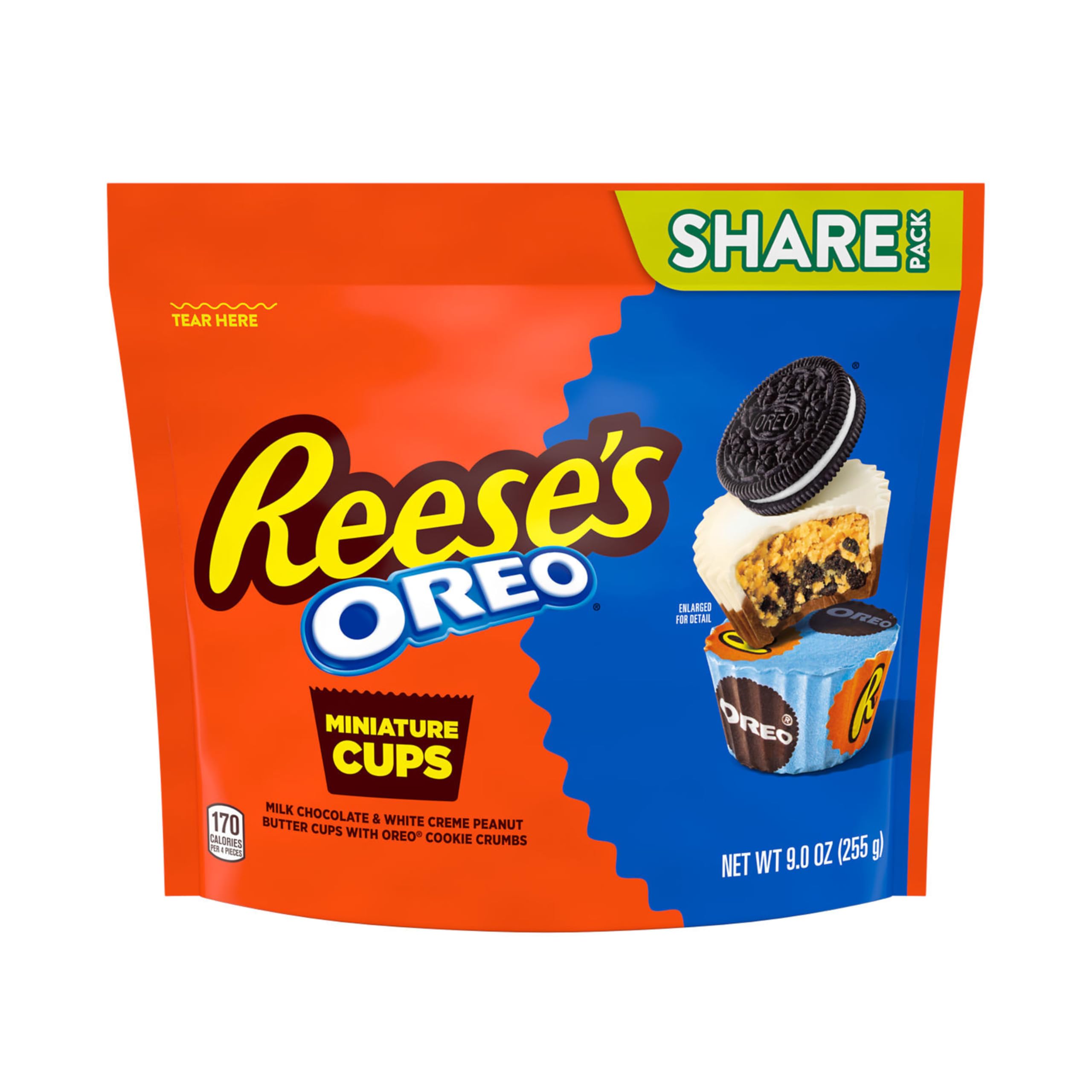 Detail of Oreo crumbs inside REESE'S OREO Miniatures dual-layer shell.
