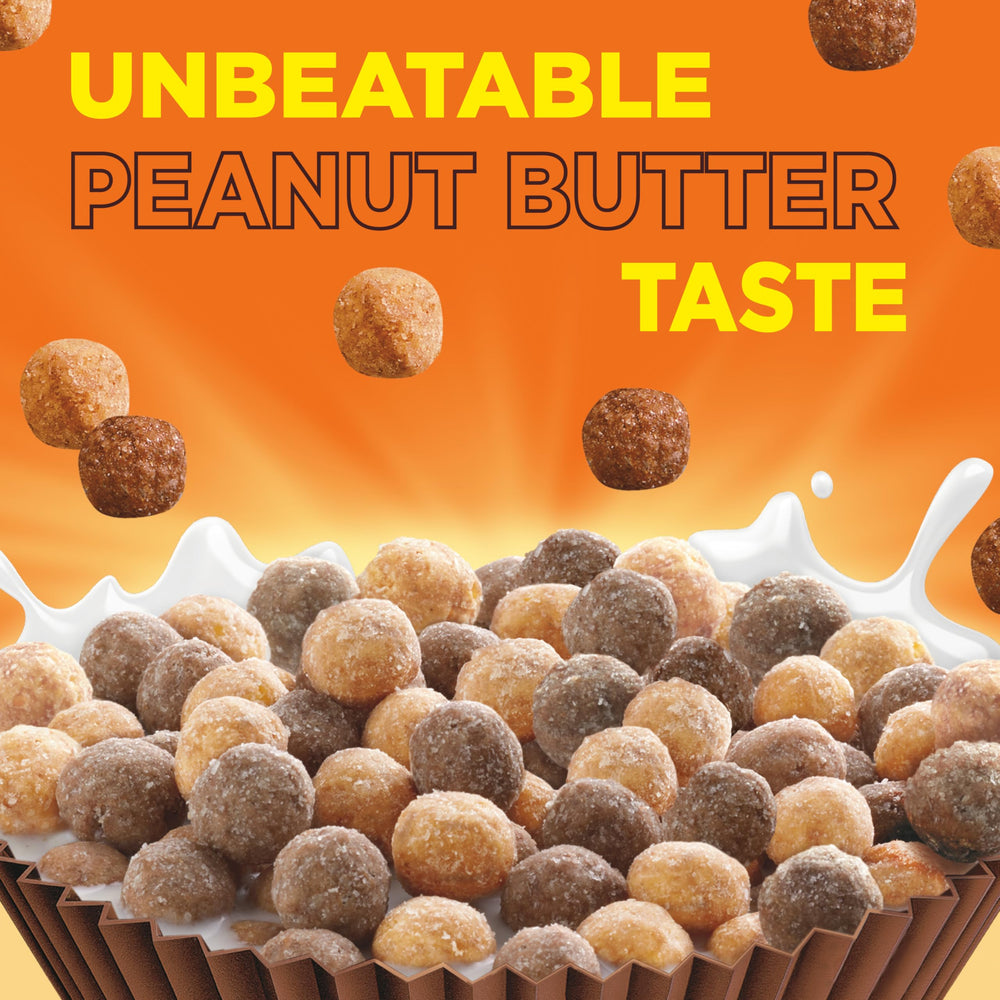 Reese's Puffs cereal pouring into a bowl with milk.