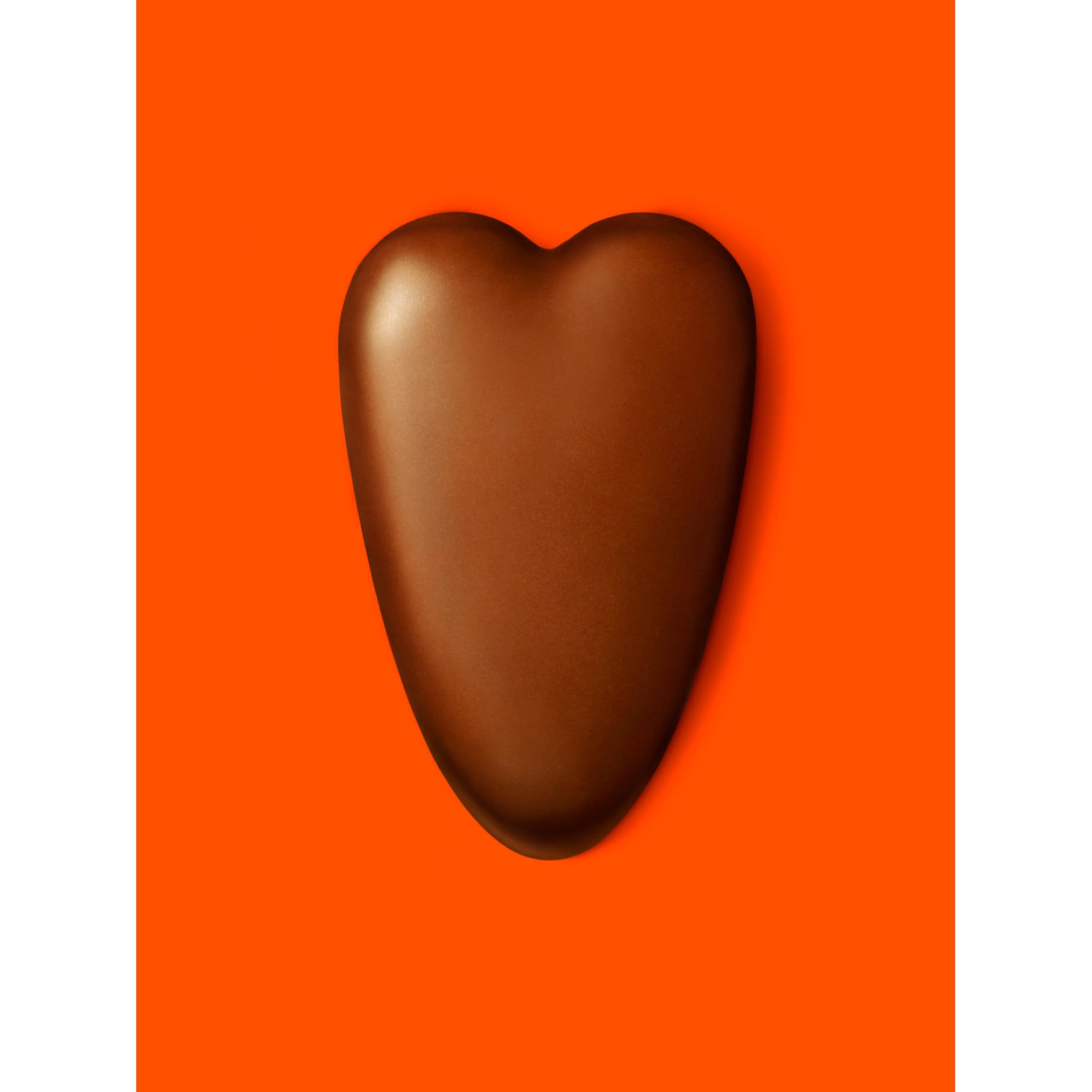 Valentine gift pack featuring Reese's hearts with card and flowers for gifting.