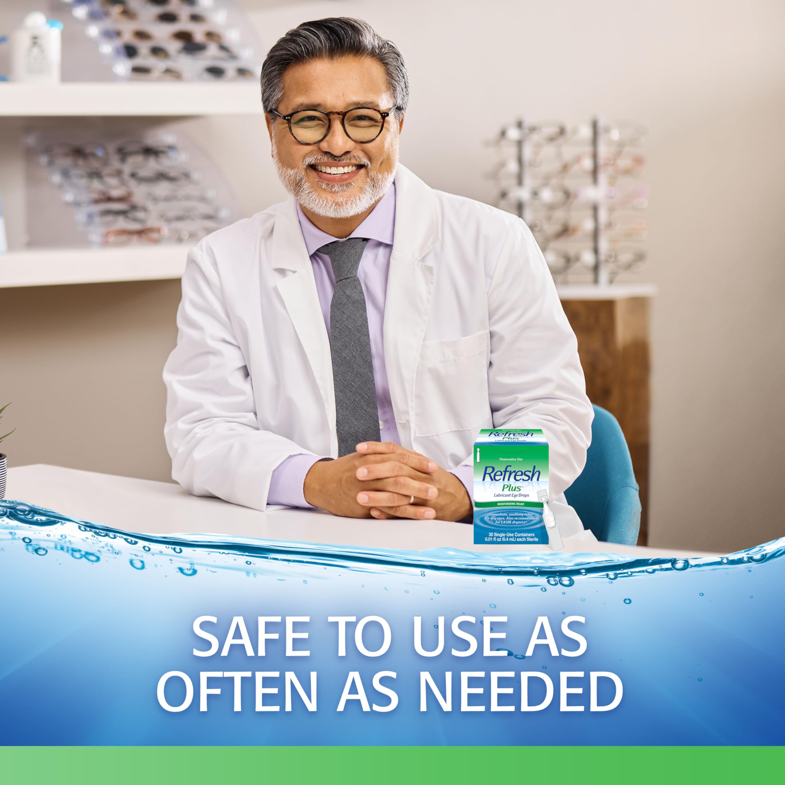 Refresh Plus in-use vial being squeezed for precise one-drop application.