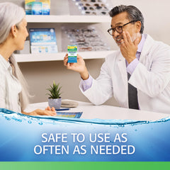 A single Refresh Tears drop landing on the eye surface for lubrication.