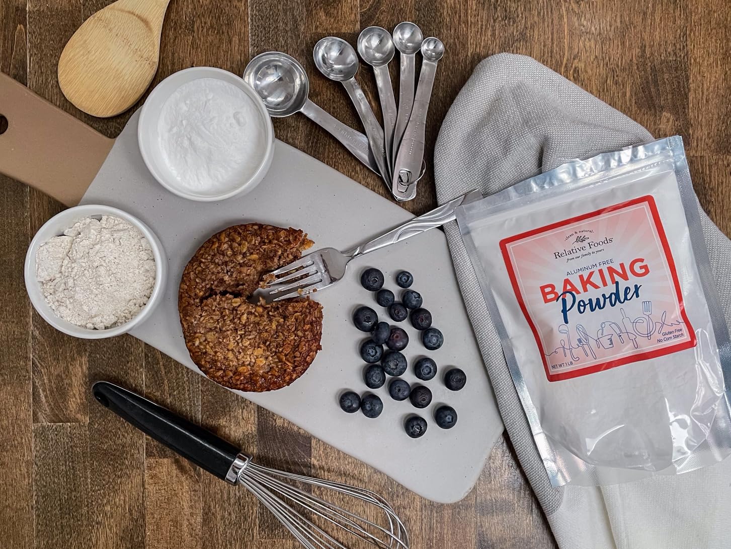 Relative Foods Baking Powder measured in a bowl for light, fluffy batter.