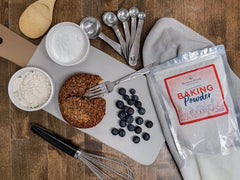 Relative Foods Baking Powder measured in a bowl for light, fluffy batter.