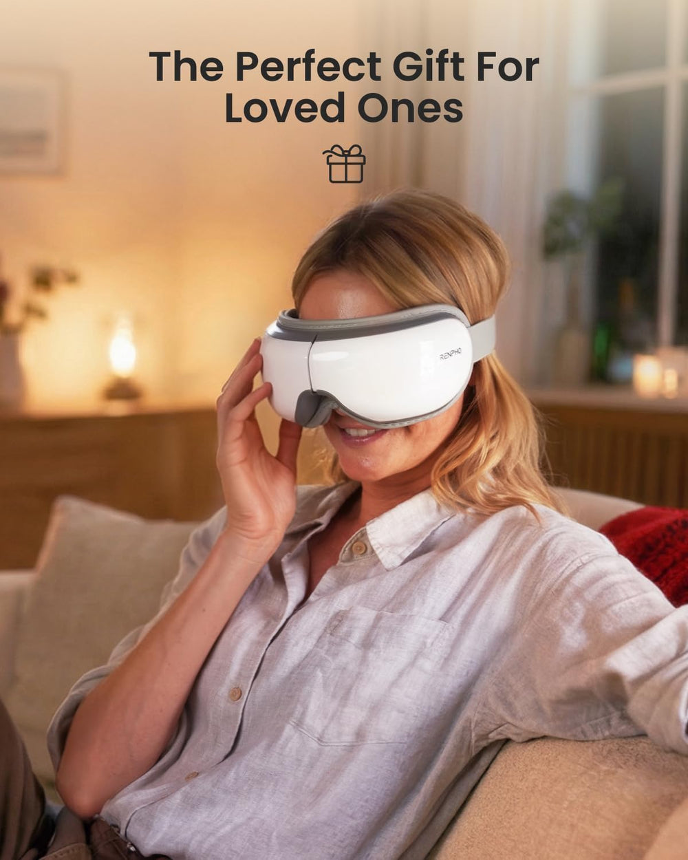 RENPHO eye massager applying oscillating pressure to eye area.