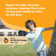 Close-up of Renzo's Invincible orange dissolvable tab for kids.