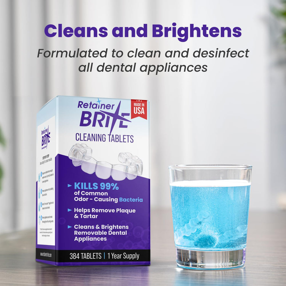 Aligner and mouthguard being cleaned with Retainer Brite tablets
