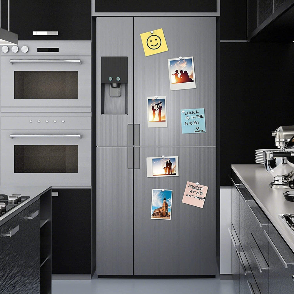 Rhinocats fridge magnets 6x3mm securing photos and notes.