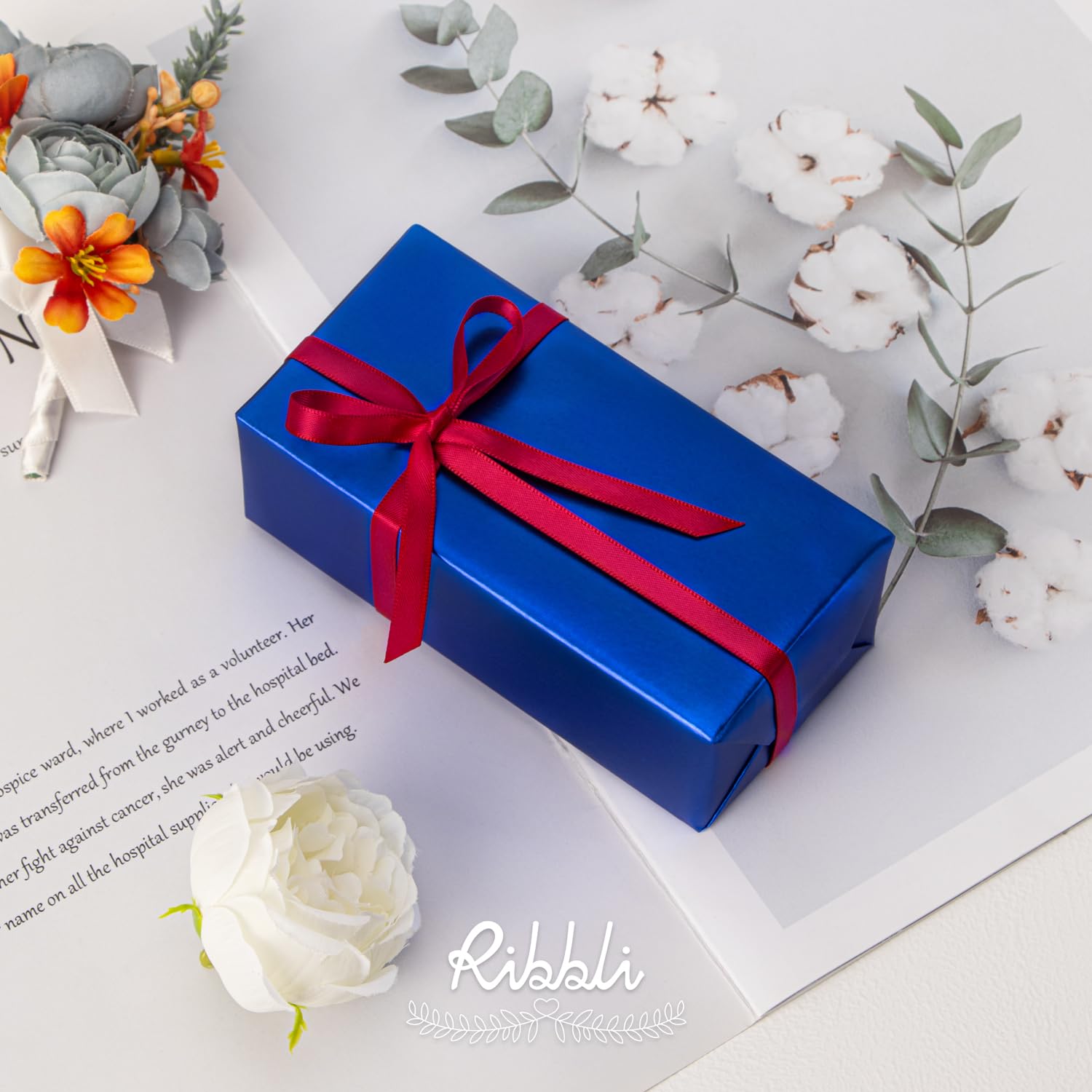 Ribbli red satin ribbon adding party décor flair and easy-to-tie bows.