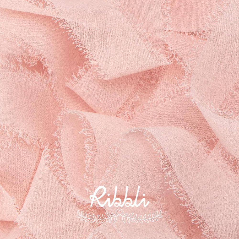Ribbli fringe edge close-up showing handmade chiffon texture.